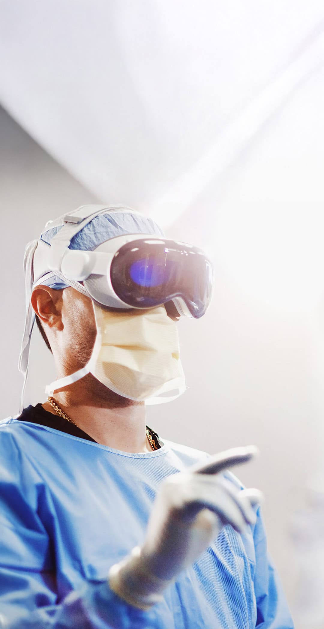 Surgeon wearing a VR headset.